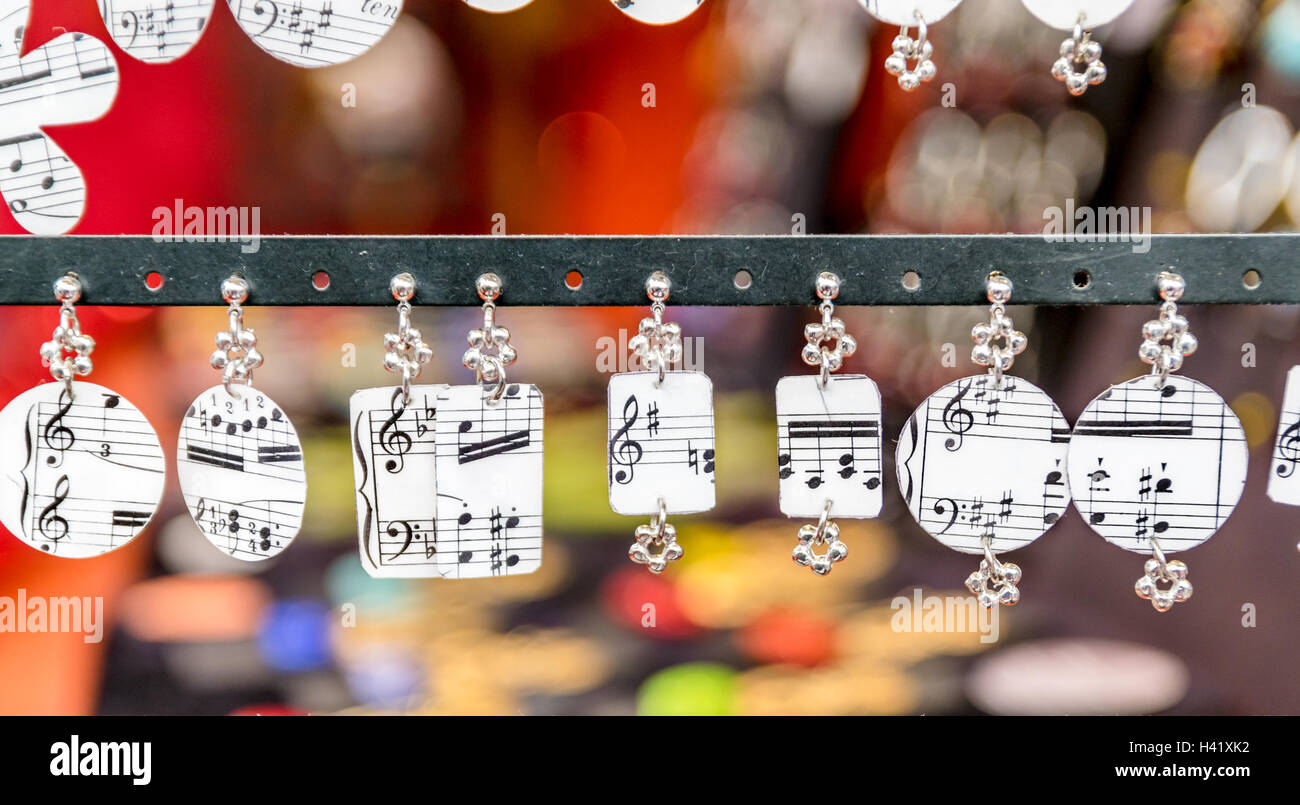 Fashion accessories with black musical notes on white background Stock