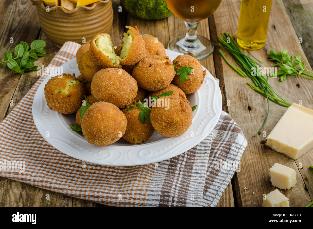 Two Potato Balls Are Partially Eaten With Cheese In The Middle Background,  Croquette On White Background, Hd Photography Photo Background Image And  Wallpaper for Free Download