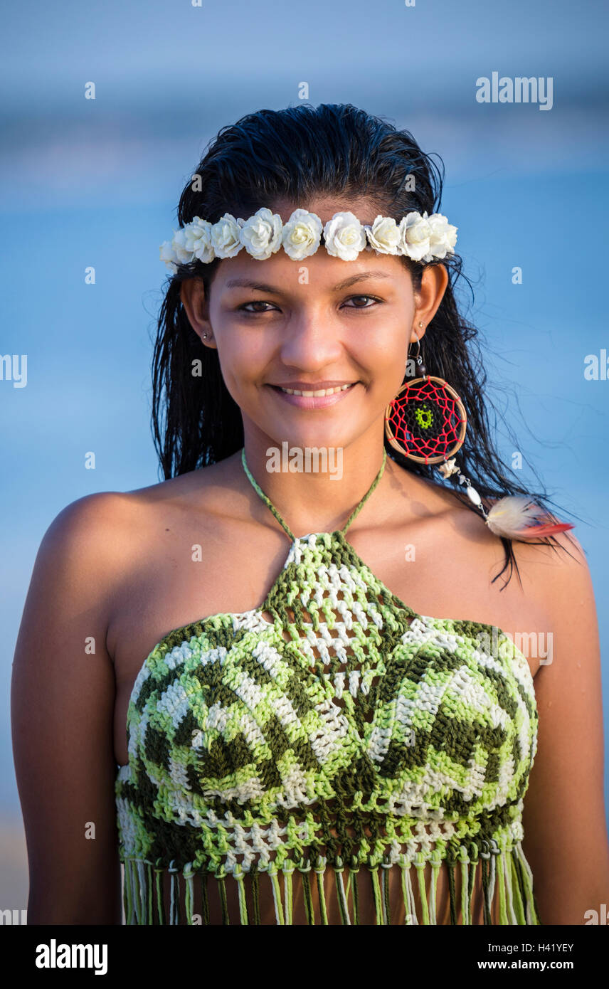 Mixed Race woman with wet hair wearing flower headband Stock Photo