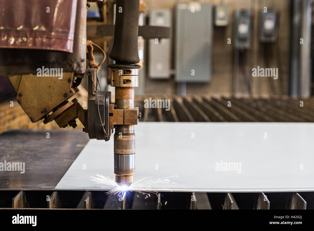 Sparking cutting tool in metal fabrication factory Stock Photo