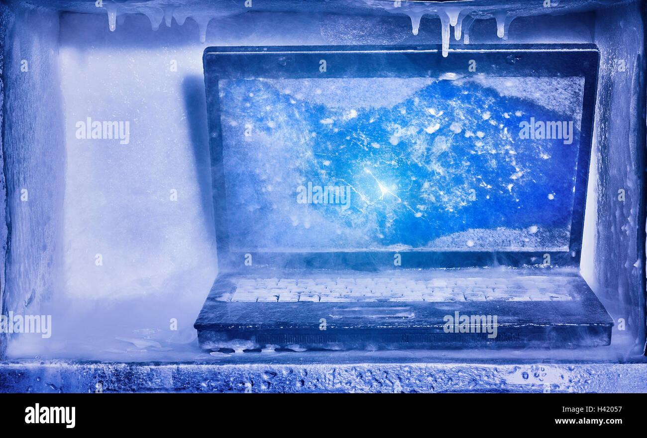 Frozen laptop computer Stock Photo