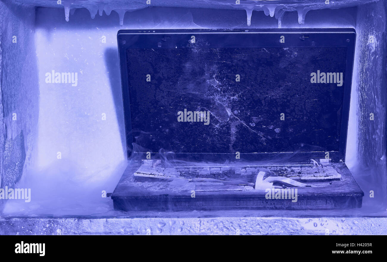 Frozen broken laptop computer Stock Photo Alamy