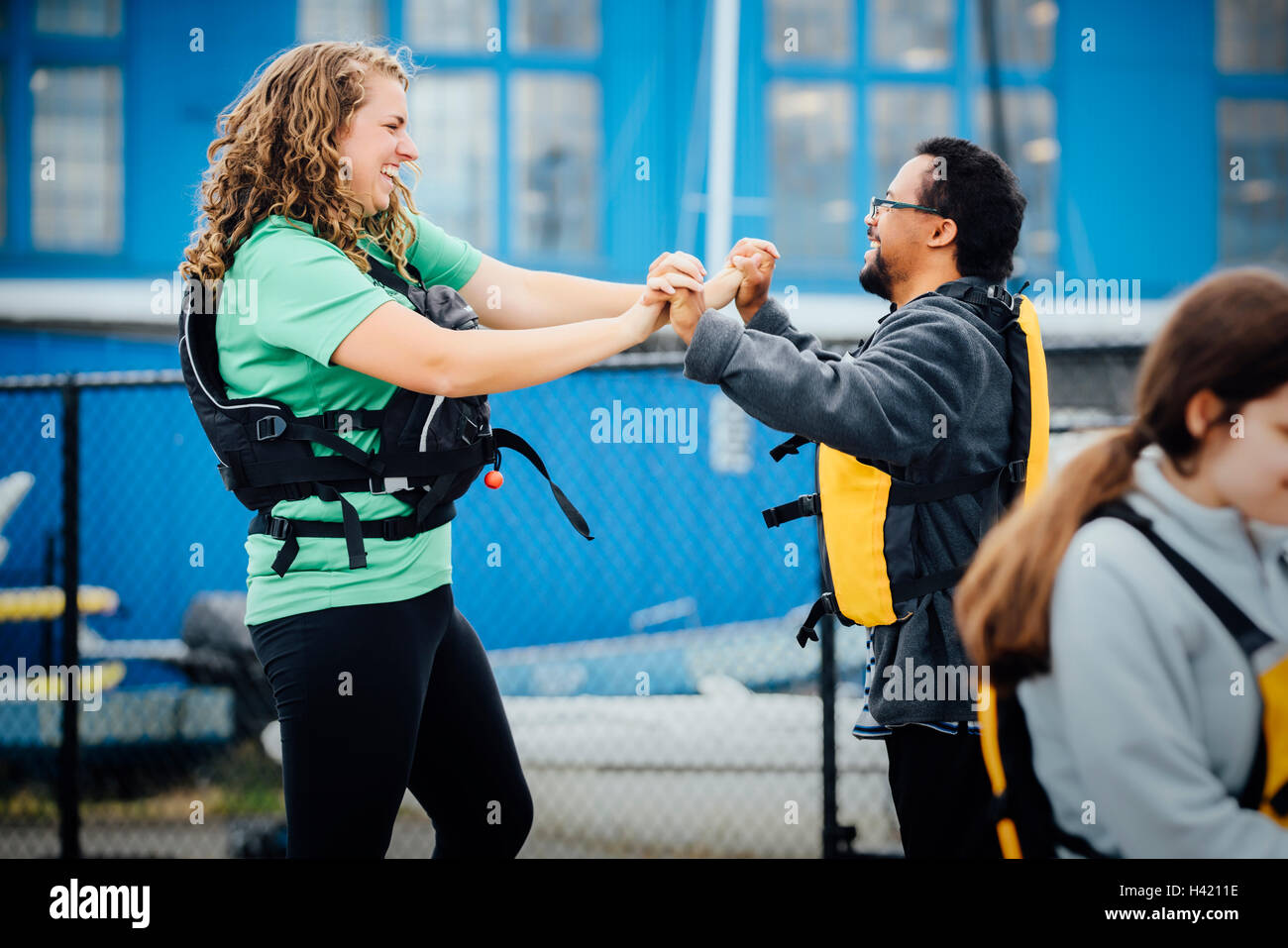 Standing group wearing jackets hi-res stock photography and images - Alamy