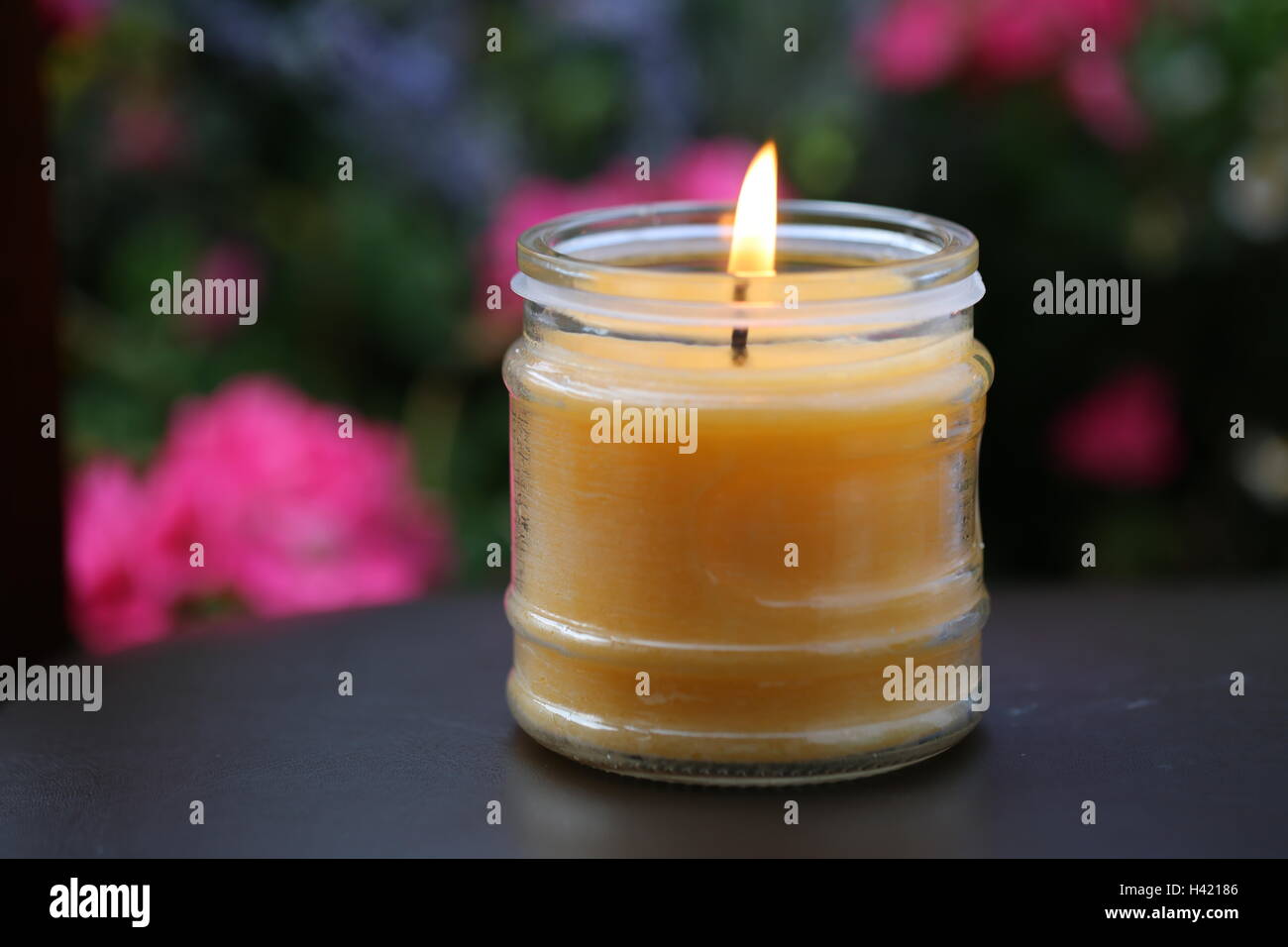 A Lit Homemade Candle Stock Photo