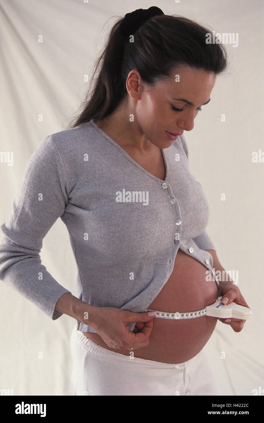 Woman, pregnant, tape measure, abdominal perimetre, measure inside