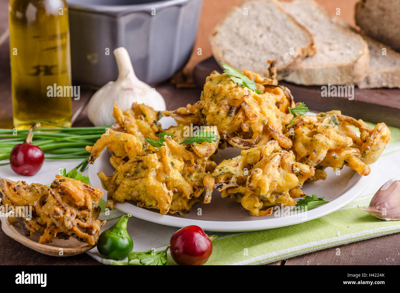 Crispy onion bhajis, delicious street food, with herbs and garlic Stock