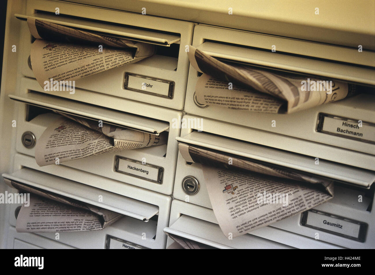 Block flats, mailboxes, detail, newspapers, spectral filters, mailbox, post, postal throw in, mail, newspapers, product photography, Still life, green Stock Photo