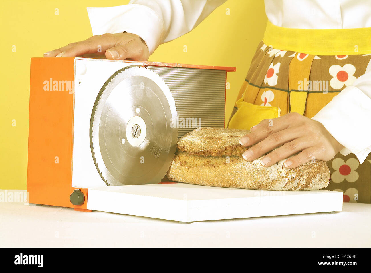 Sliced Bread in Cutting Machine / Industrial Bread Slicer in Supermarket  with Bread Crumbs. Ready to Use Stock Photo - Alamy