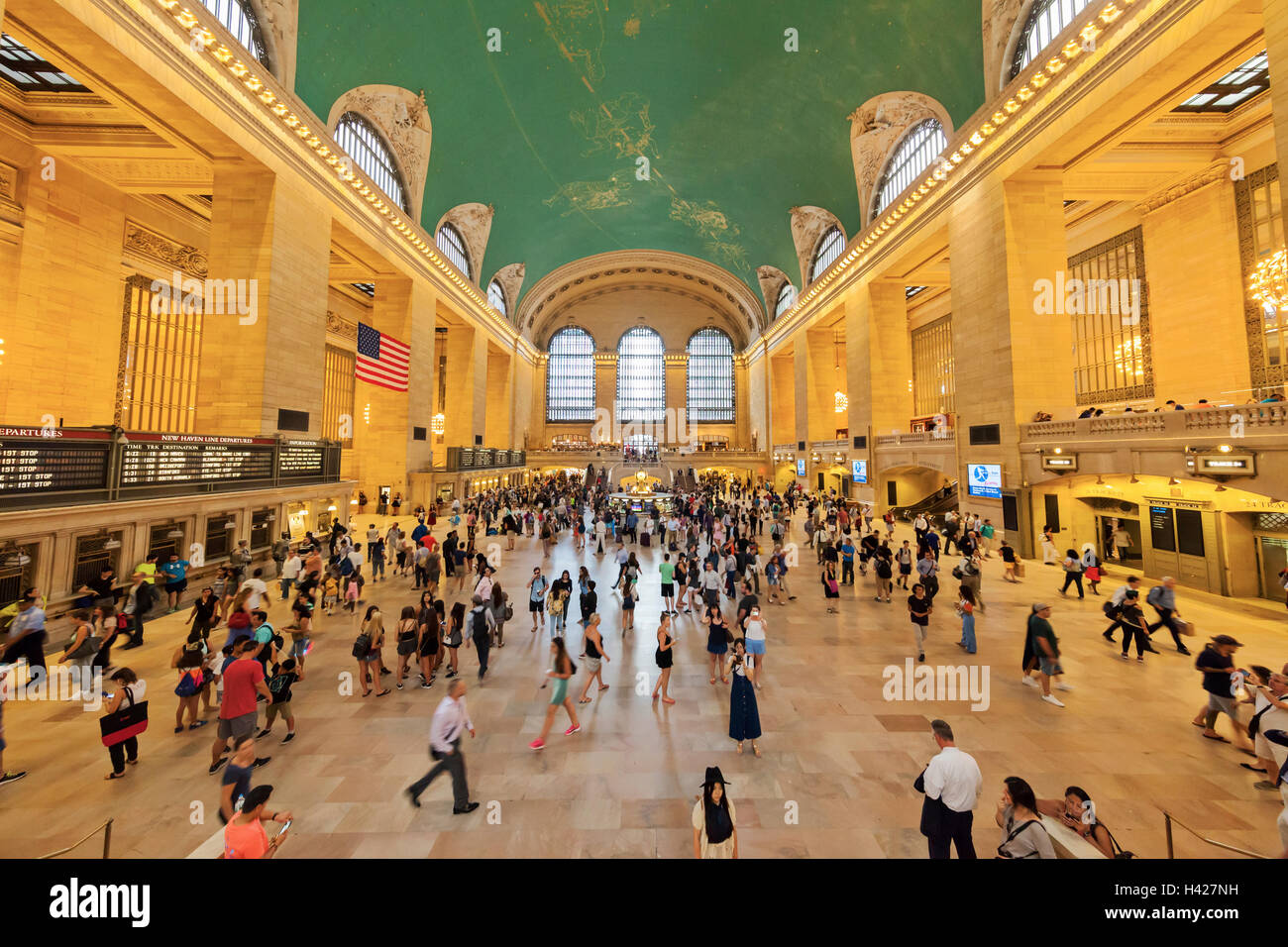 An interior view of Grand Central Station in New York City with all the travelers. Stock Photo