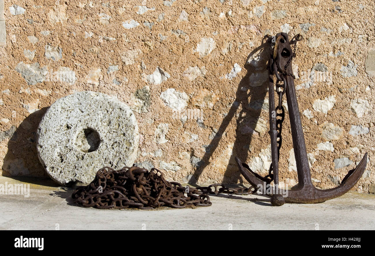 House defensive wall, detail, anchor, catena, millstone, icons, agriculture, fishing, navigation, defensive wall, Stone wall, facade, iron chain, iron anchor, stone, around, Stock Photo