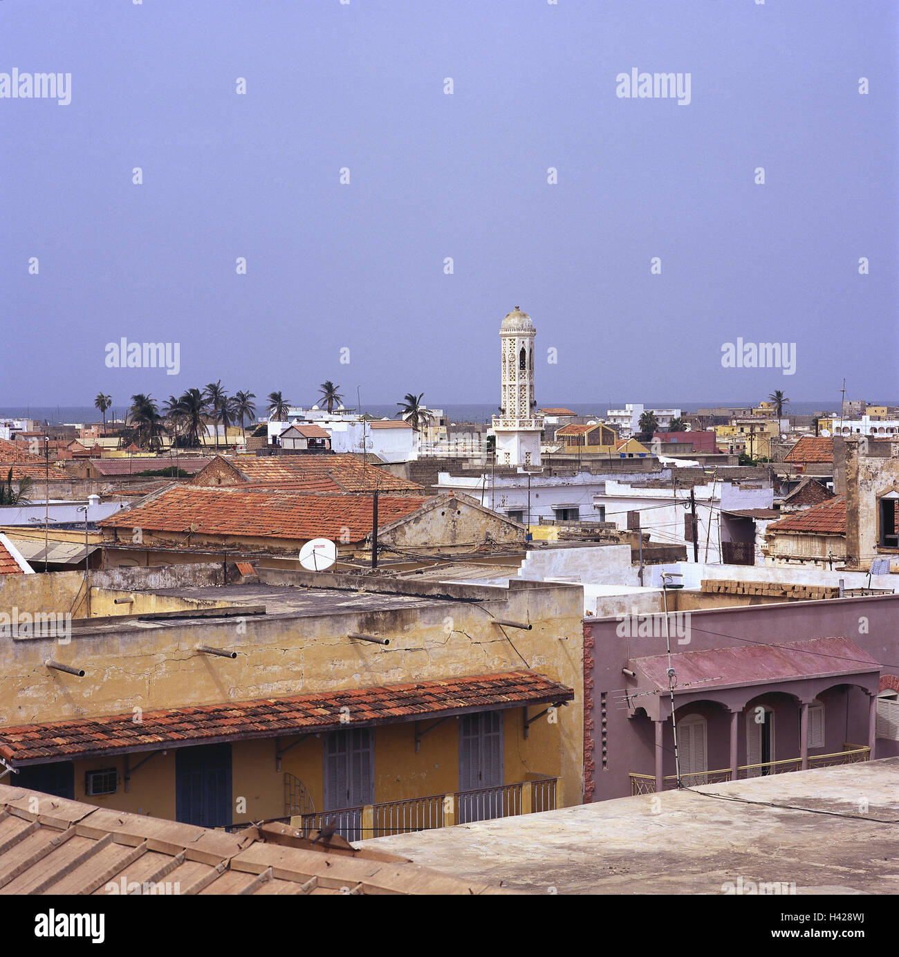 Senegal, Saint-Louis, town overview, sea, Africa, West Africa, Saint Louis, town, Ndar, houses, house roofs, weather-beaten, dilapidatedly, minaret, tower, palms, copy space, Stock Photo