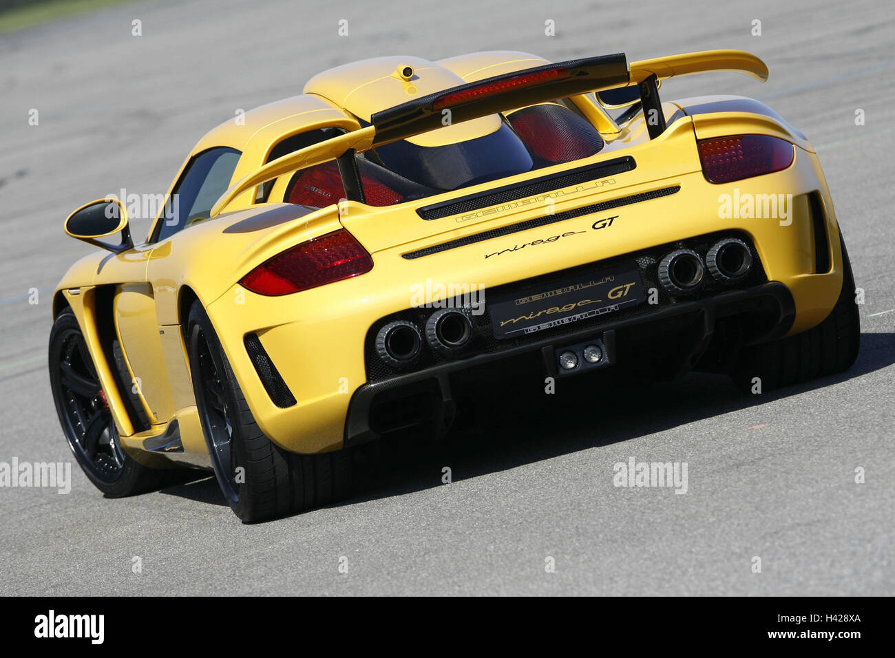 Of Gemballa' Mirage GT', Porsche, yellow, outside, diagonally, aslant rear view, dynamically Stock Photo