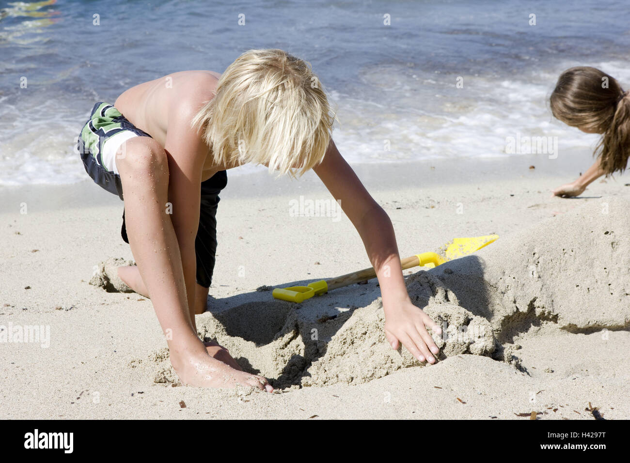 boy leg swimsuit by sea waves