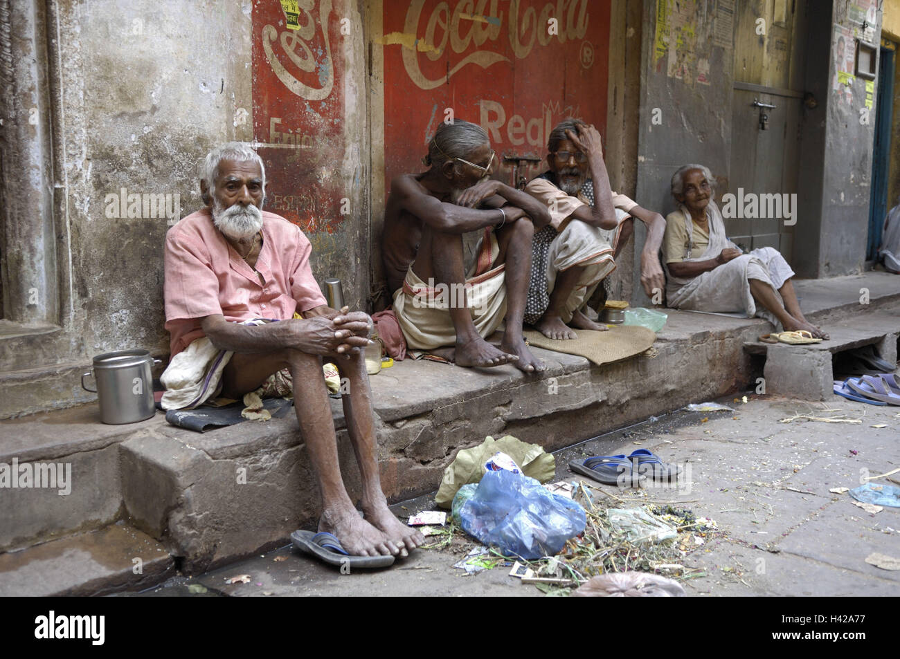 India, Uttar Pradesh, Varanasi, roadside, person, sit, Stock Photo