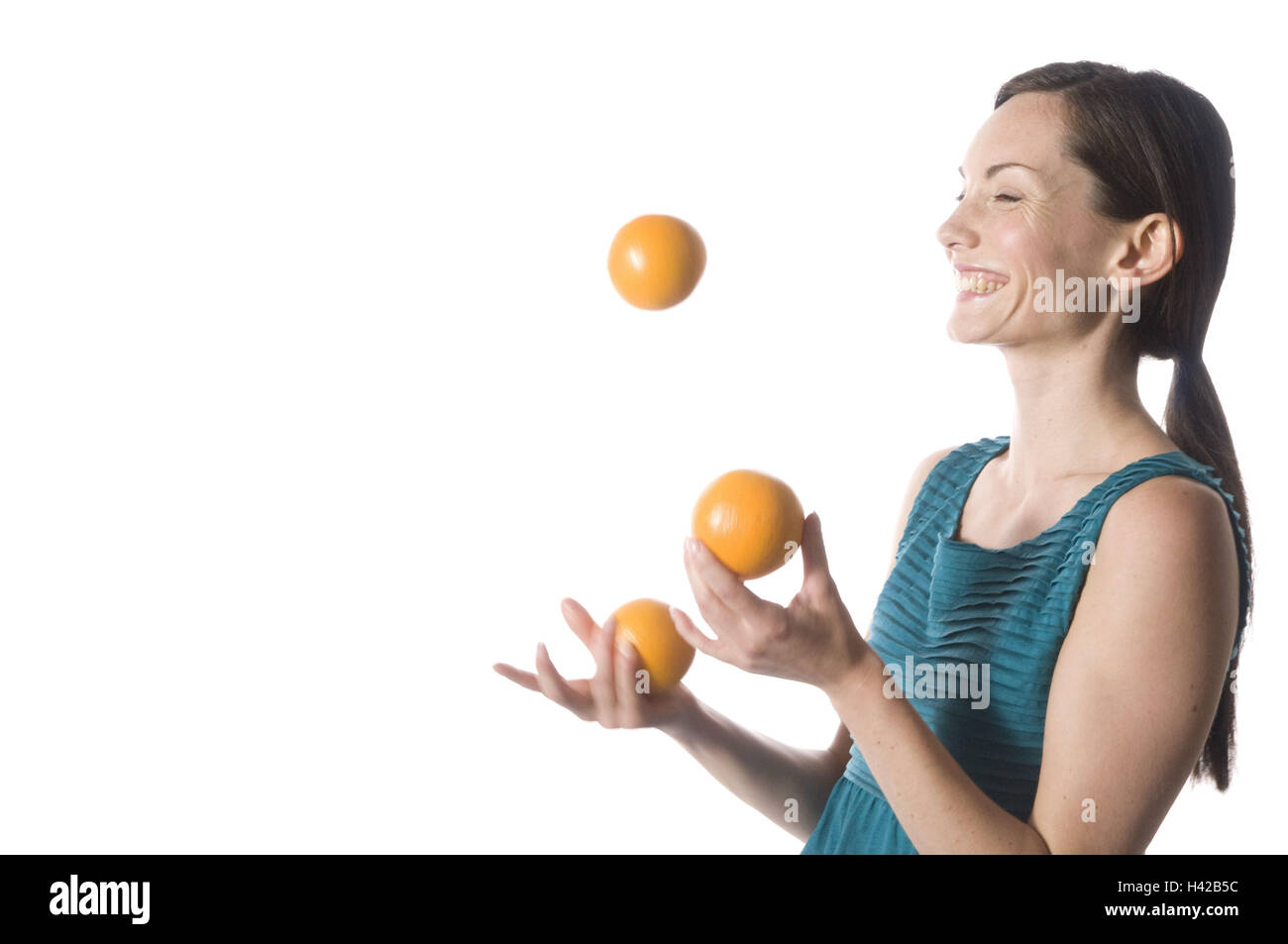 Woman, oranges, juggle Stock Photo Alamy