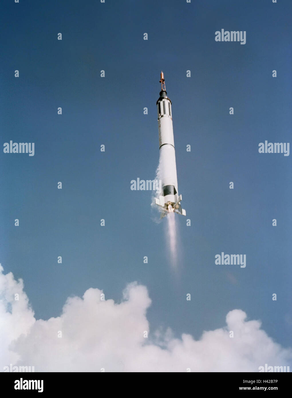 The Mercury Redstone capsule carrying NASA astronaut Alan Shepard and the Freedom 7 spacecraft blasts off from the launch pad May 5, 1961 in Cape Canaveral, Florida. The flight marked the first time an American flew into space. Stock Photo
