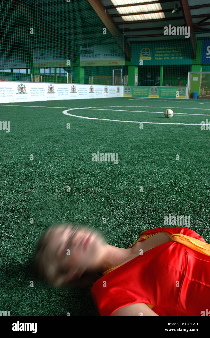 Gymnasium, soccer field, woman, lies, unconscious, fuzziness Game field