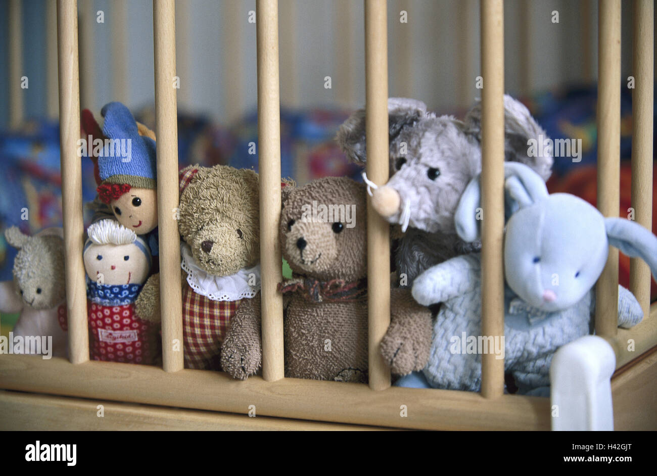 Cot, grid, soft toys, lined up, bed, playpen, cot, toys, toys, soft toys, soft animals, 'comforters', soft corner, unnoticed, abundance, toys abundance, mites, pollutants, toys, Still life, material recording Stock Photo