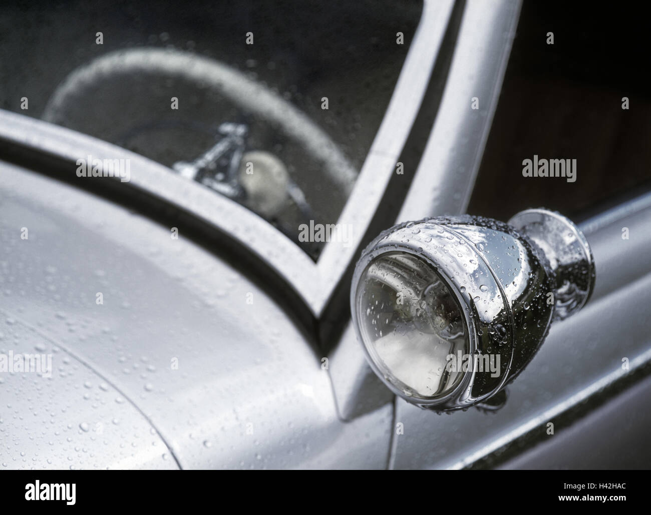 Car, old-timer, detail, headlight, windscreen, wet, vehicle, passenger car, silver, flatly, brilliantly, polishes, cultivated, nobly, old, window, window pane, car window, steering wheel, windscreen, insight, notch, brightness, rain, drop of water, raindrop, rain weather, moisture, nostalgically, in an old-fashioned way, luxury, nostalgia, collector's object, collector's item, traffic, transport, economy, automobile industry, Mercedes Stock Photo