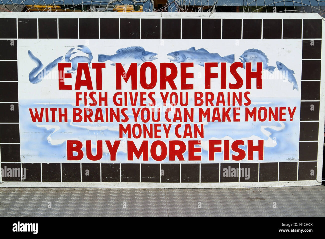 Wall, advertisement poster, slogan, "Eat more fish...", Europe, Germany