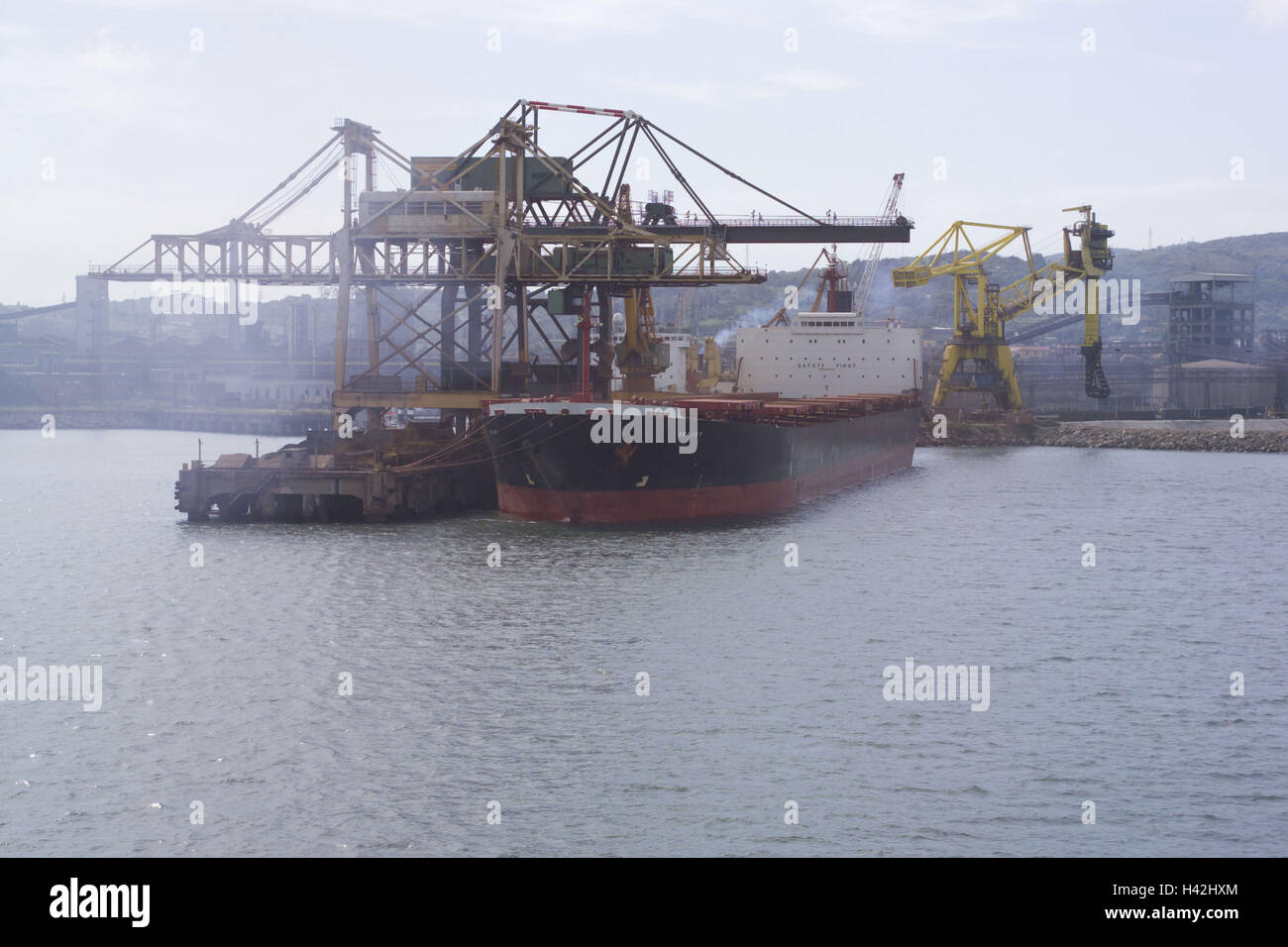 Italy, Tuscany, Piombino, container port, ship, charge, discharge, Europe, town, port, piers, loading engine, ship, freighter, freighter, charge, container, ship container, charge, transport, Cargo, logistics, freighter journey, navigation, ship traffic Stock Photo