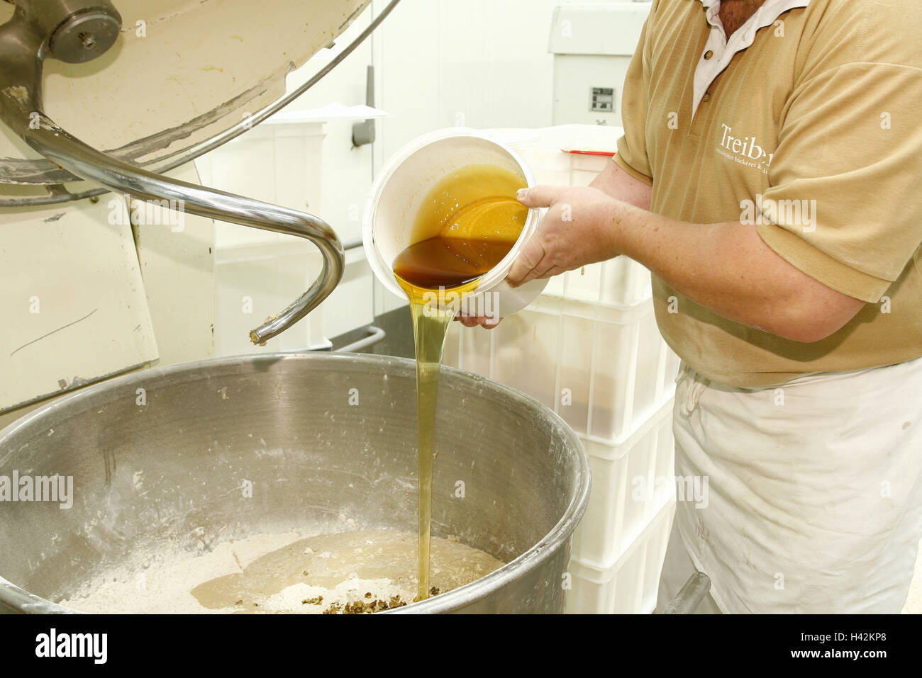 Bread production, kneading machine, baker, detail Stock Photo Alamy