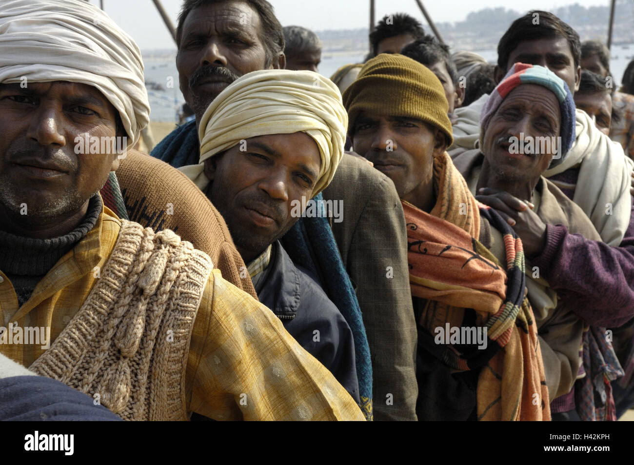 India, Uttar Pradesh, Allahabad, Kumbh Mela, men, queue, Stock Photo