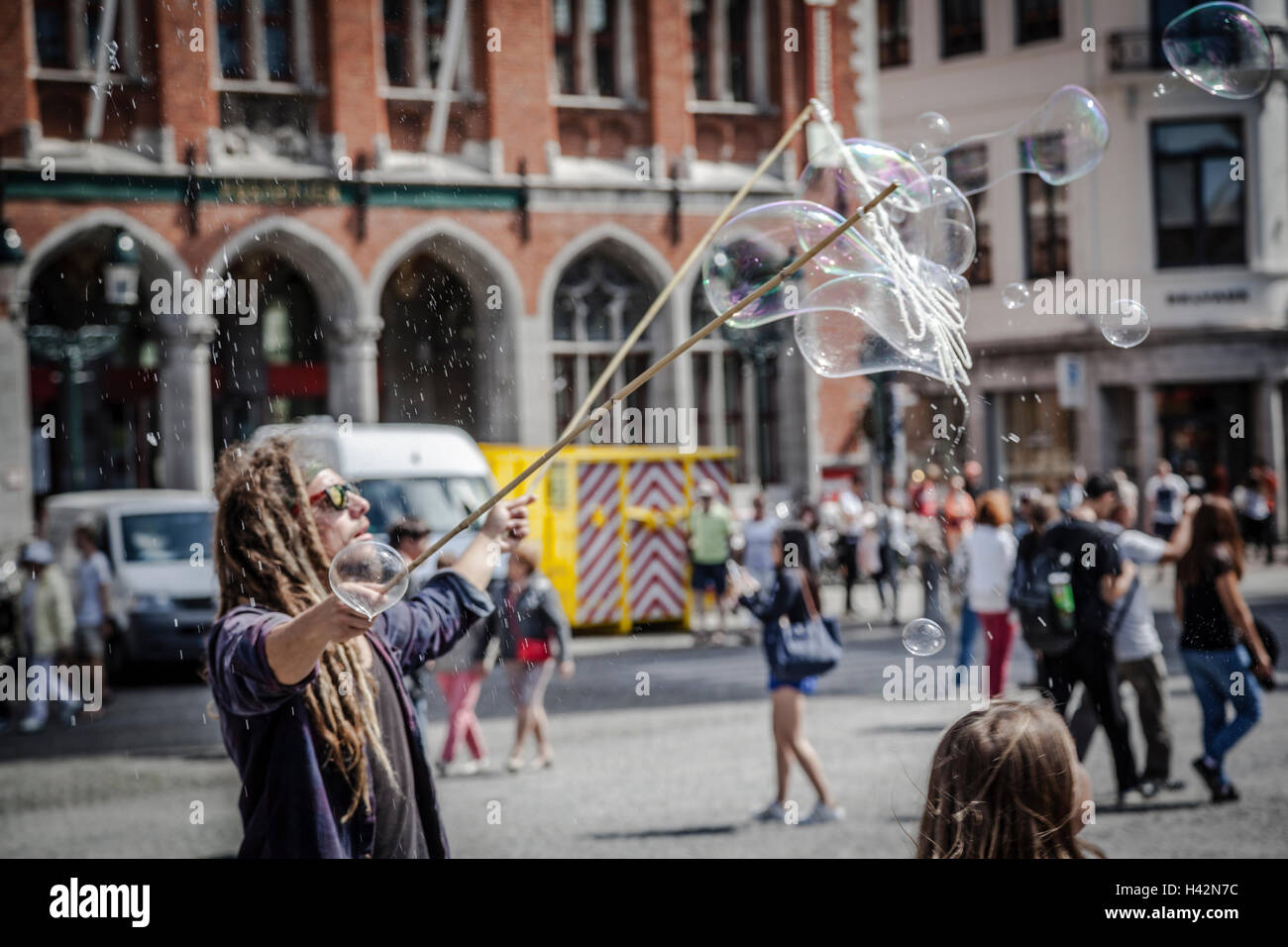 Big bubbles from the bubble blower at main square, Belgium, Bruges