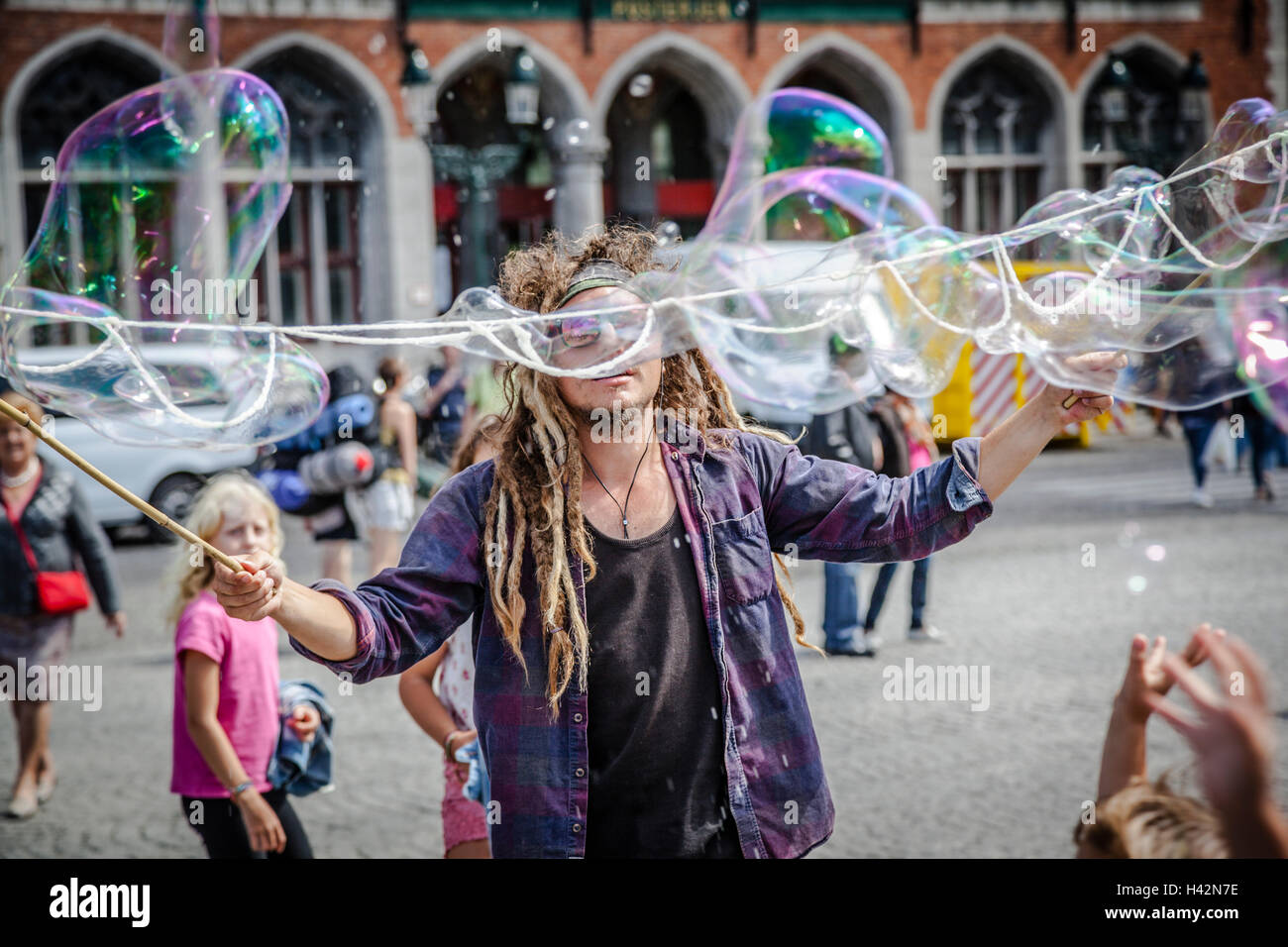 Big bubbles from the bubble blower at main square, Belgium, Bruges