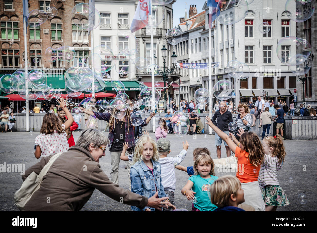 Big bubbles from the bubble blower at main square, Belgium, Bruges