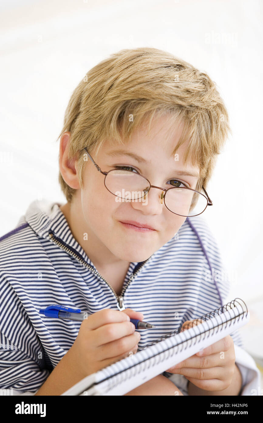 Boy, glasses, write, ballpoint pen, portrait, model released, Stock Photo