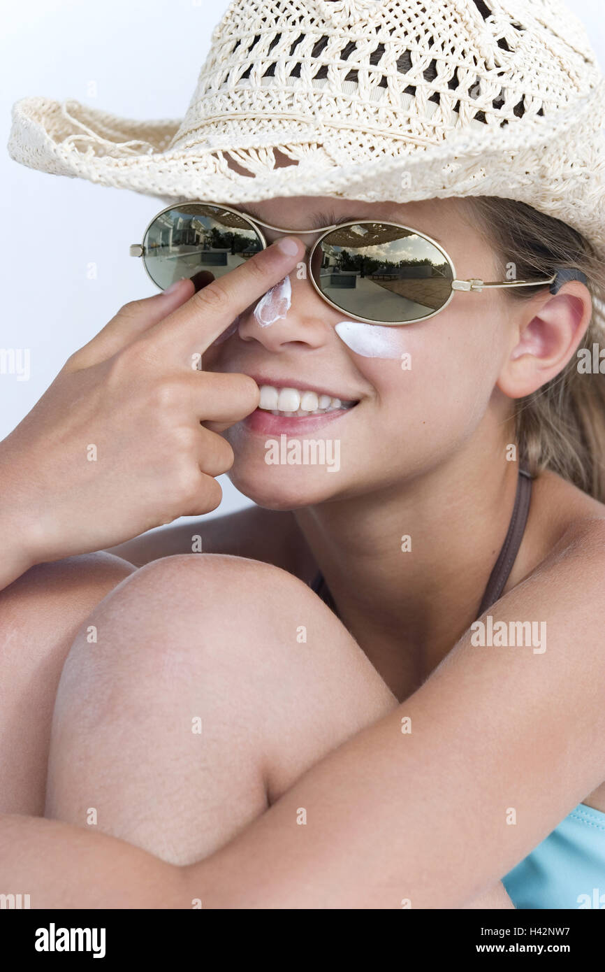 Girls, smile, cream sunglasses, gesture, sun lotion, straw hat, portrait, Stock Photo