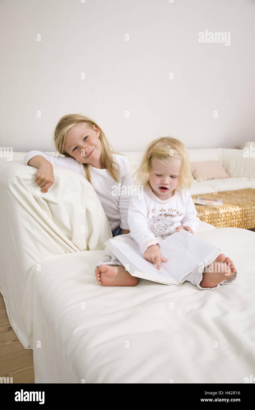 Living Rooms Couch Children Girls Cheerfully Sits Book Stock