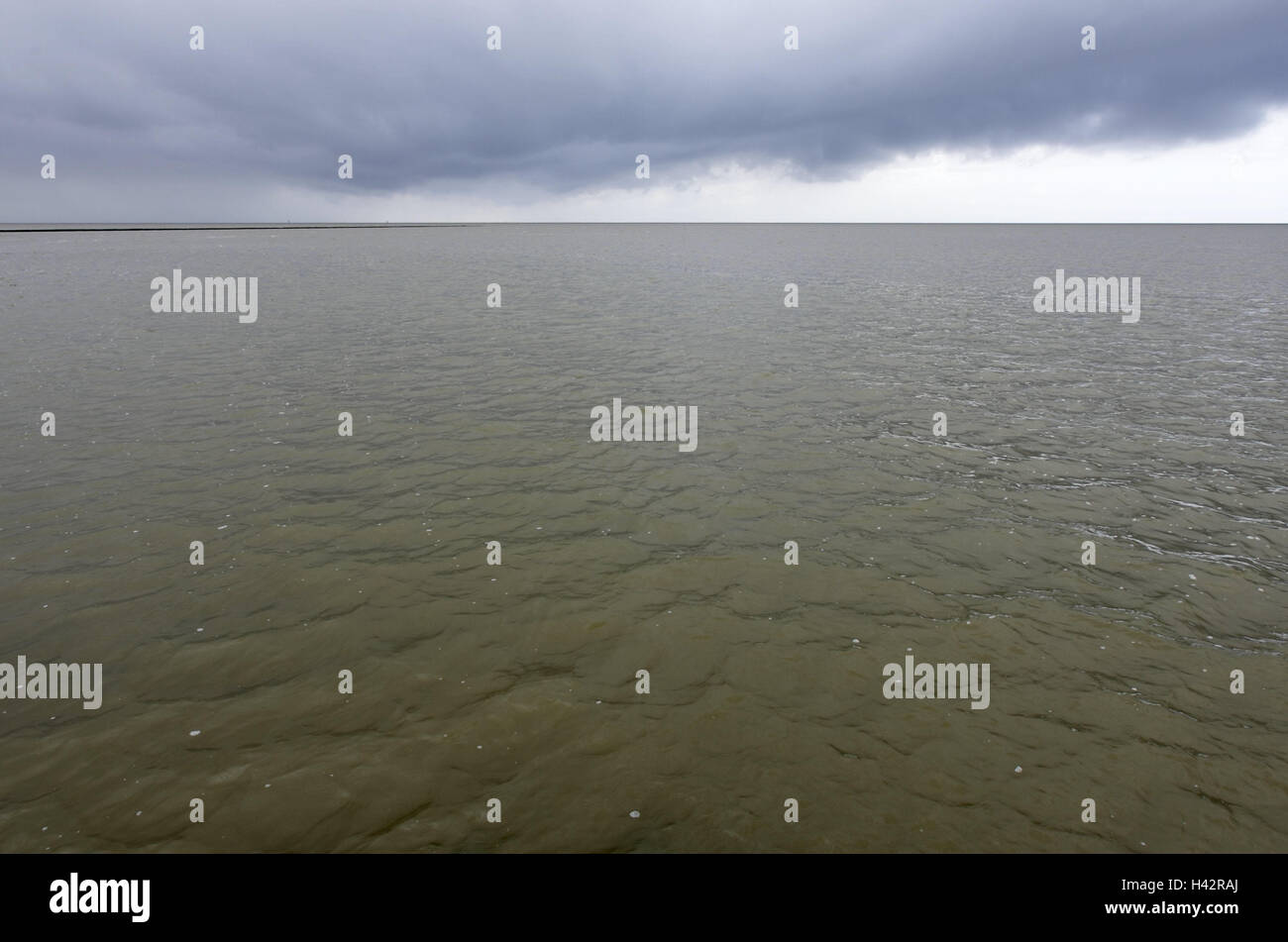 Germany, Lower Saxony, Dorum-new field, the North Sea, cloudy sky, North Germany, coast, North Sea coast, mud flats, sea, tide, national park, nature, heaven, holiday resort, tag, colour, darkly, width, distance, horizon, waves, rain clouds, grey, thunderstorm, wind, vacation, nature power, storm clouds, water surface, Stock Photo