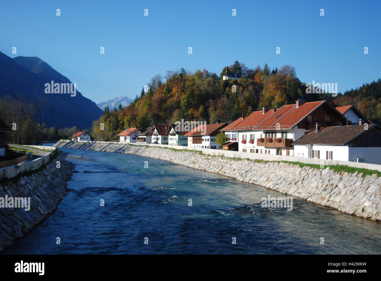 Germany, Bavaria, Eschenlohe, local view, river Loisach, autumn, Upper Bavaria, Werdenfels, Loisachtal, village, place, rurally, Loisach, waters, course of a river, Uferverbauung, flood control, mountains, hills, band, chapel, St. Santa's band, nobody, autumnally, season, Stock Photo