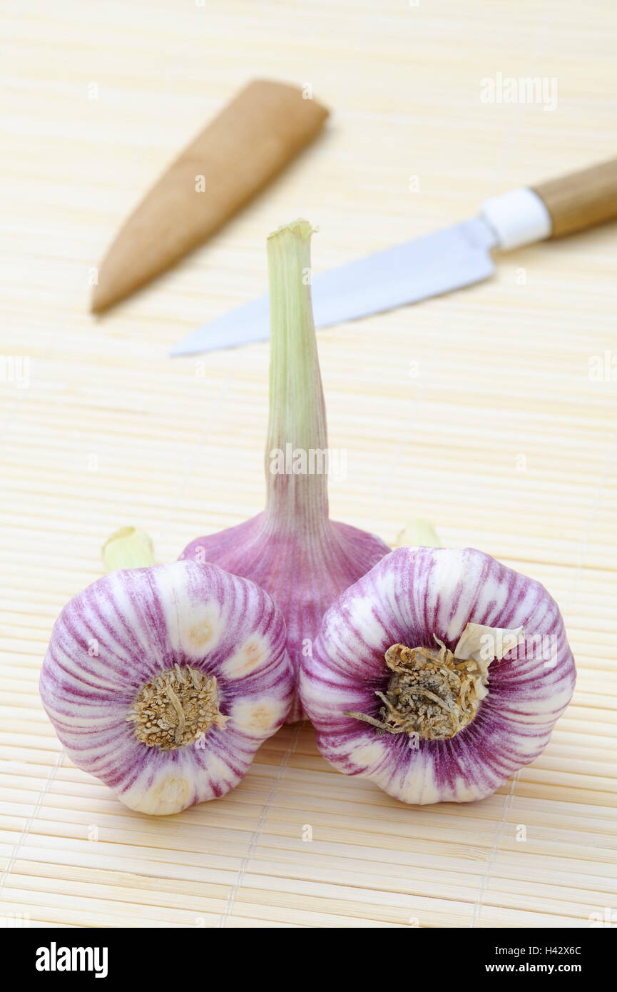 Garlic nodules, knives, Stock Photo