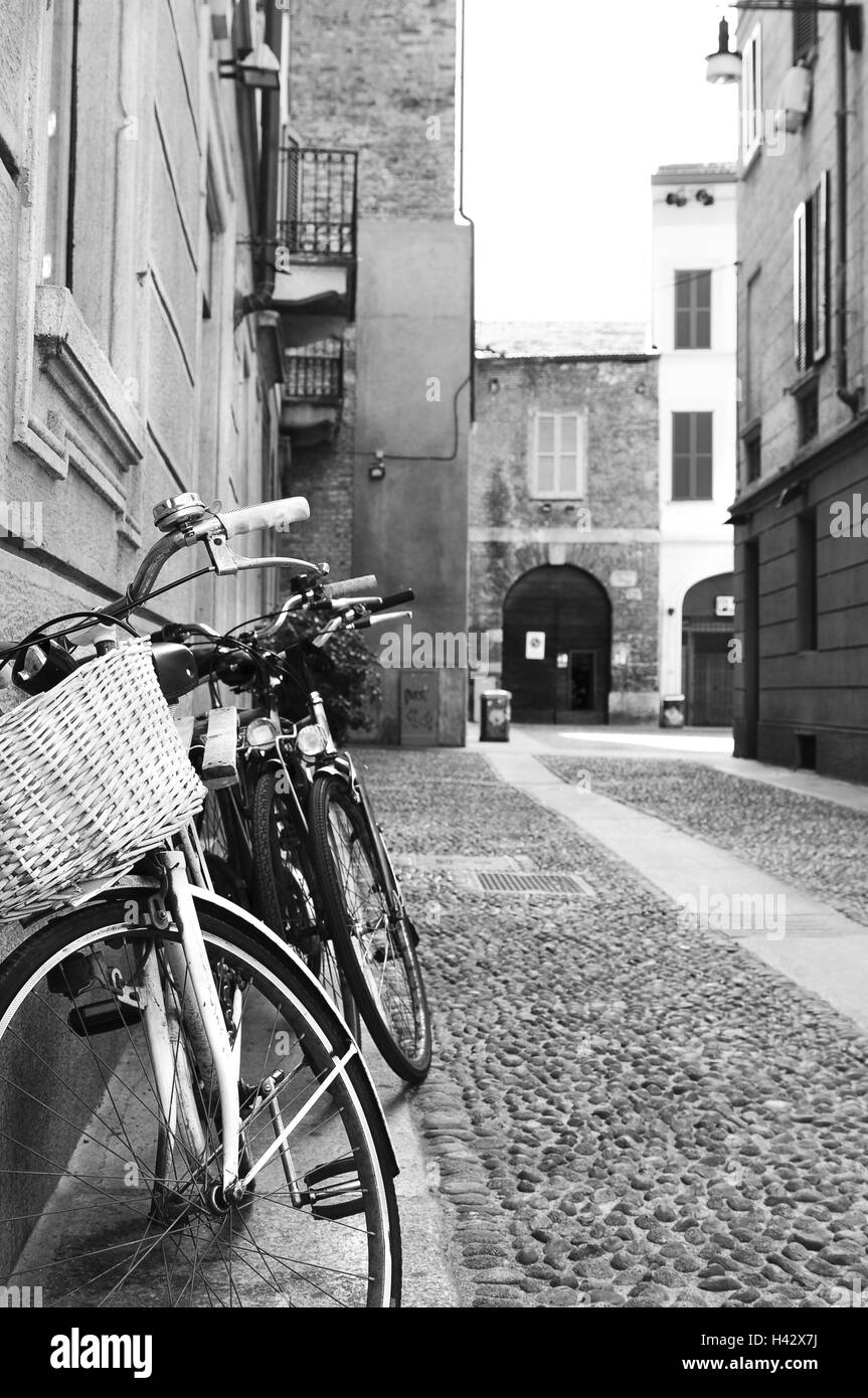 Italy, Milan, lane, bicycles, lean, wall of a house, Stock Photo