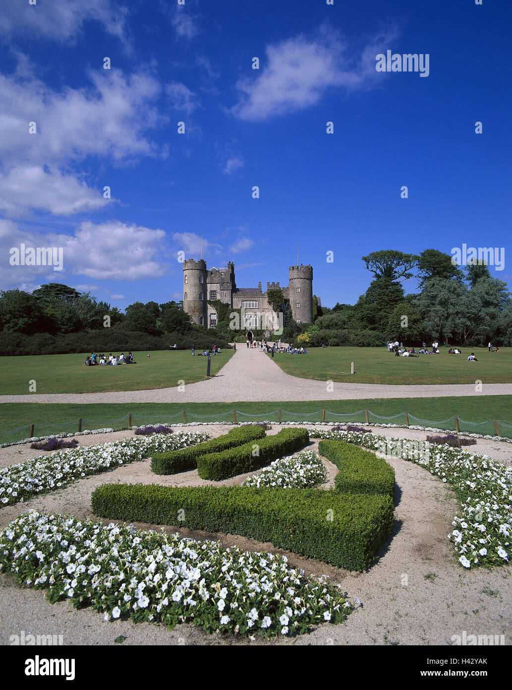 Ireland, Dublin, Malahide Castle, castle grounds, flowerbeds, tourists