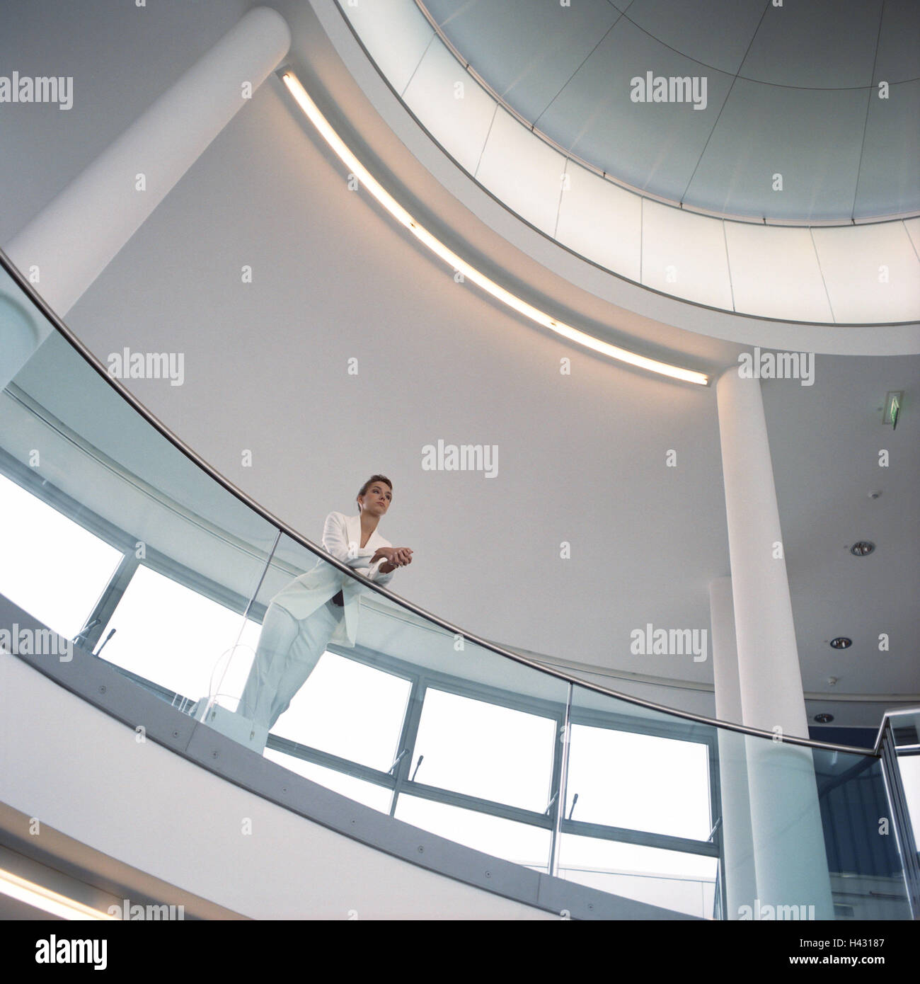 Office buildings, hall, glass balustrade, manager, rest on, thoughtful, from below, business, hall, walk, glass railing, railing, balustrade, glass, woman, 22 years, businesswoman, work break, rest, recover, wait, waiting period, patiently, think, conside Stock Photo