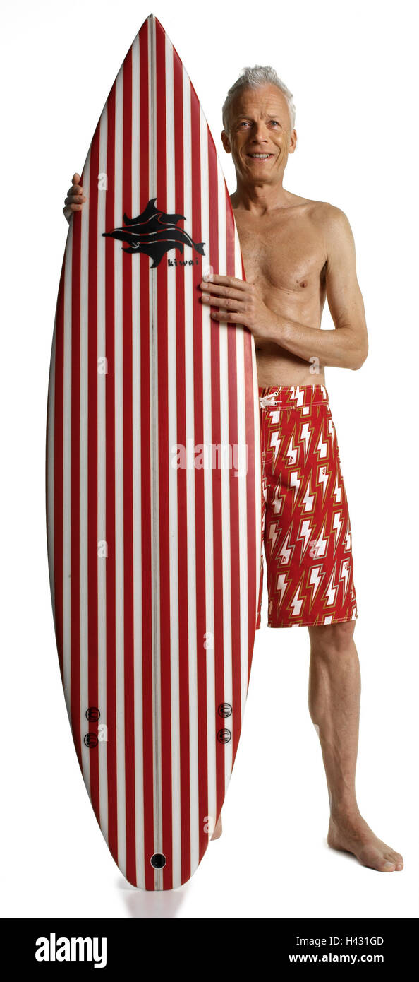 Boss, swimming trunks, surfboard, icon, vacation, summer vacation, retirement, leisure time, rest, sport, water sport, wave bleed, senior citizens, surfers, man, old, old person, grey-haired, shorts, swimwear, upper part of the body freely, summery, barefoot, agile, actively, fit, actively, sportily, slender, smile, stand happily, happily, contently, proudly, confidently, point, present, surfboard, surfing, surfing, Surfriding, surfing, whole bodies, copy spaces, studio, Stock Photo