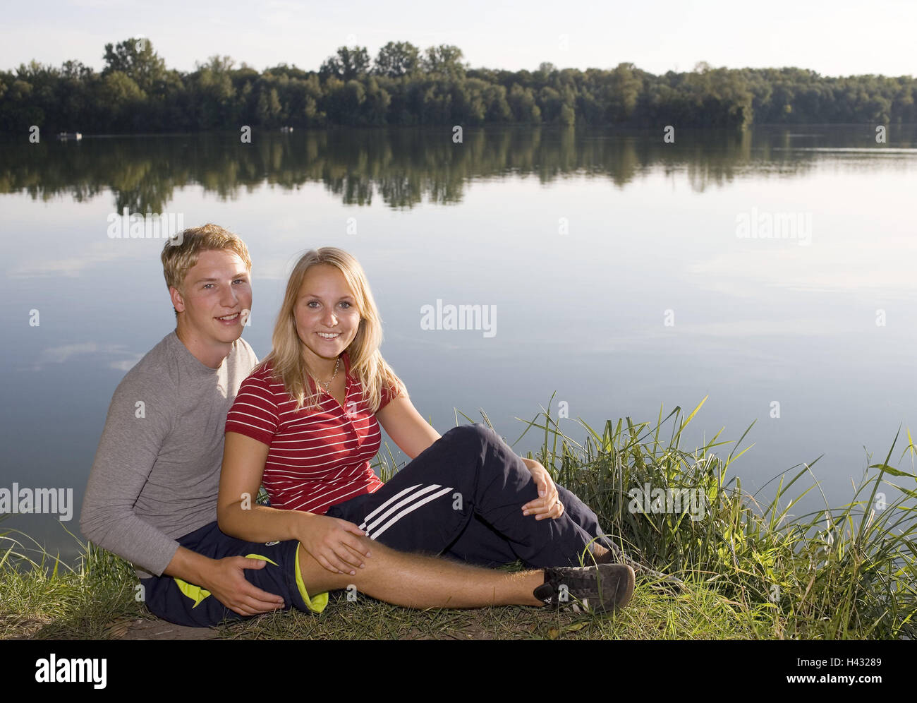 Couple, young, happy, lakesides, sit, people, youth, blond, falls in love, leisure time, together, partnership, respect, lake, shores, water, sunny, summer, outside, togetherness, smile, Stock Photo