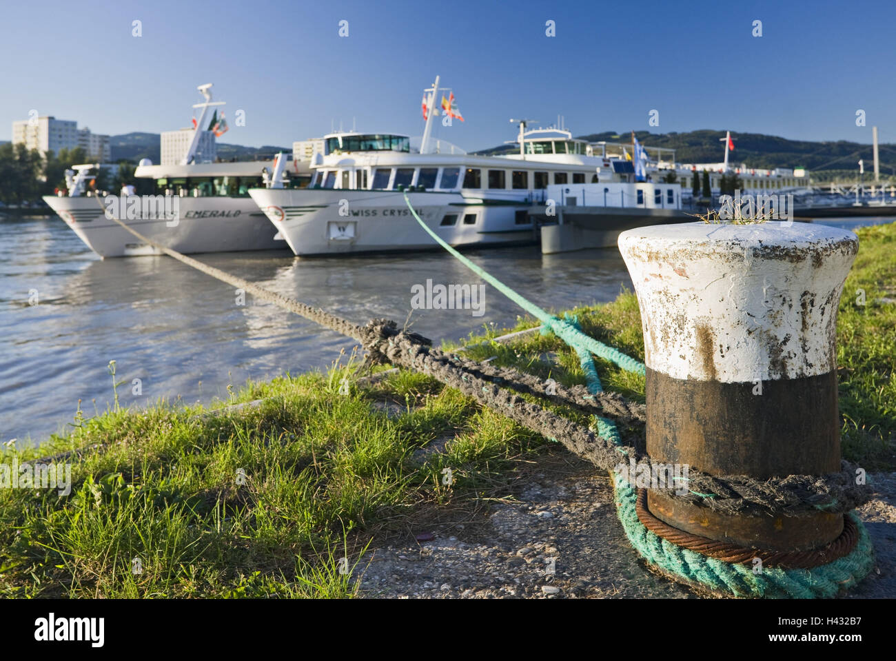 Austria, Upper Austria, Linz, Danube river, Ships moored at dock Stock ...