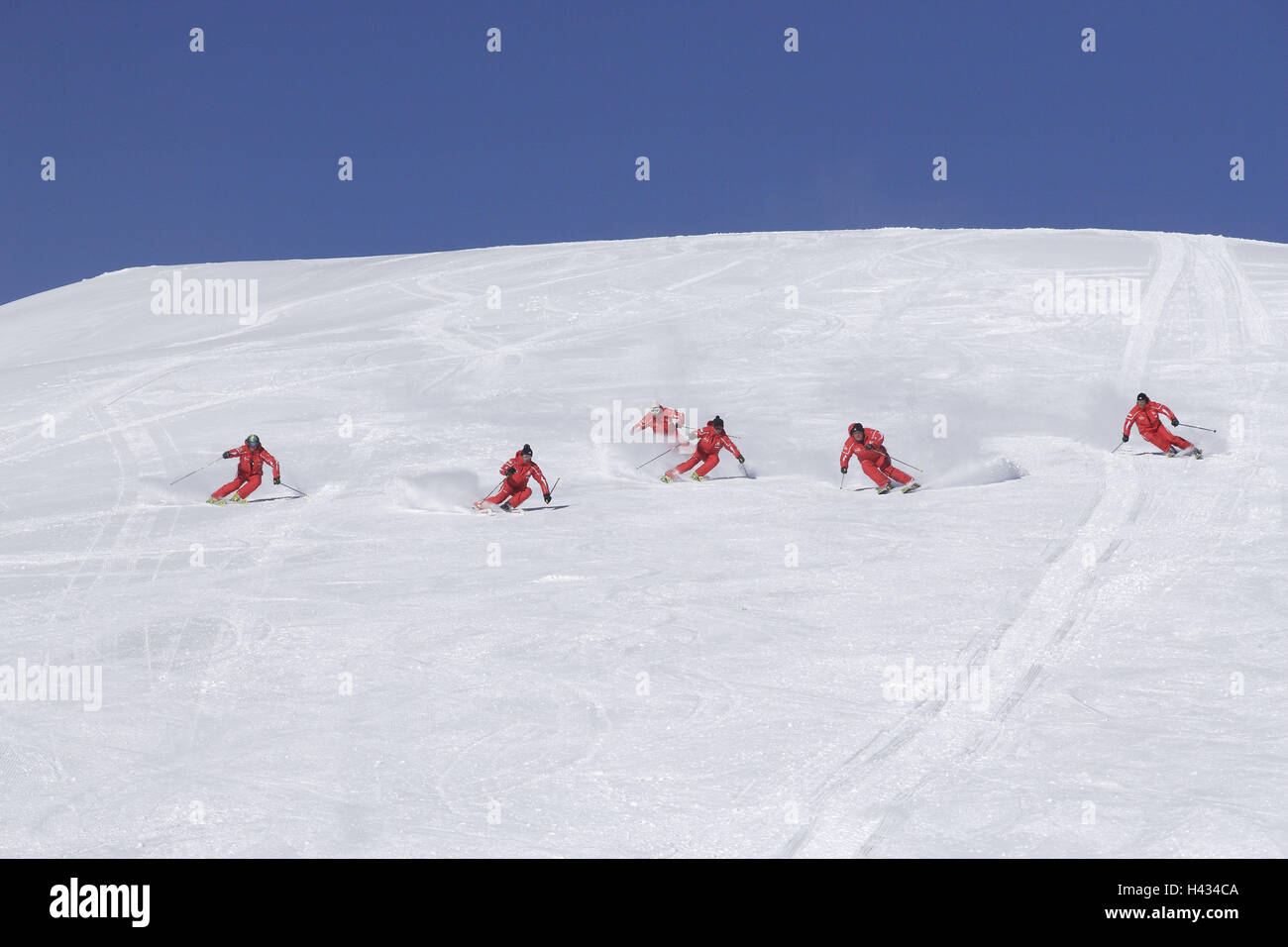 Ski runway, skier, six, drive, no model release, Austria, Tyrol, Ladis, alps, mountains, mountains, season, winter, snow, snow-covered, winter sports area, winter sports, skiing area, tourism, tourism, immediately, with each other, suits, ski suits, red, cloudless, ski instructor, Stock Photo