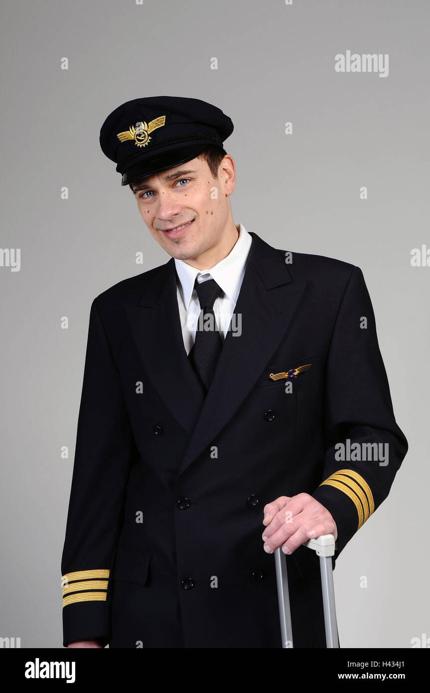 Pilot, smile young, uniform, view camera, half portrait, model released