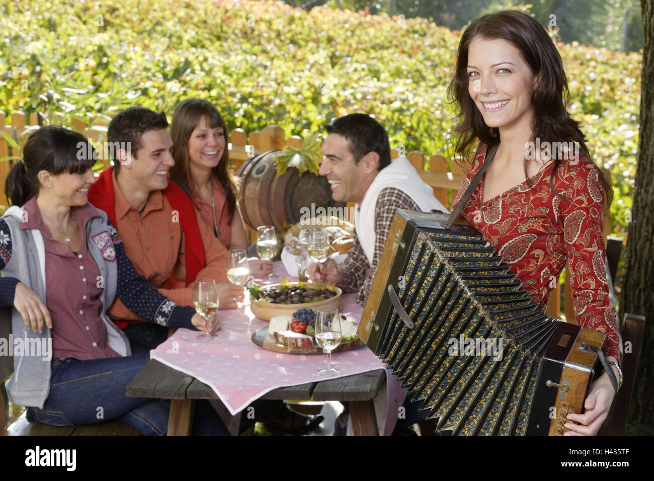Men, women, young, Törggelen, music, wine degustation, Brixen, South Tyrol, Italy, Stock Photo