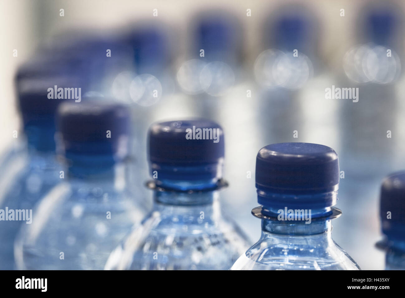 Mineral water, plastic Bottles, seals, detail, blur Stock Photo Alamy
