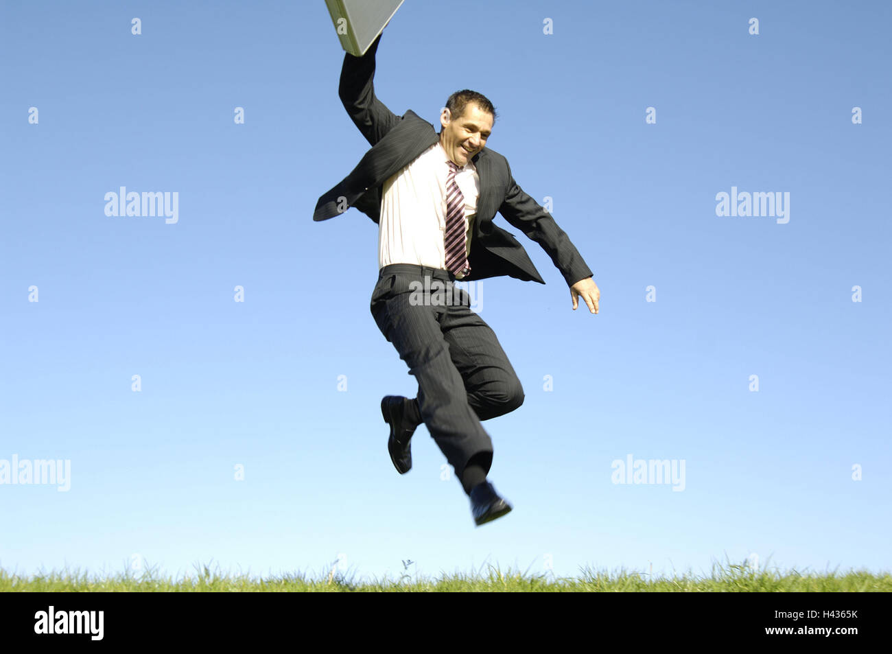 Man, suit, suitcase, caper, jumping, joy, motivation, success, business