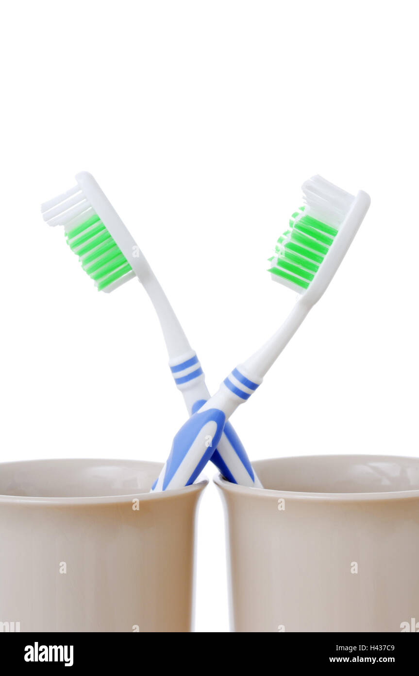 Toothbrushes, mugs, medium close-up, Stock Photo