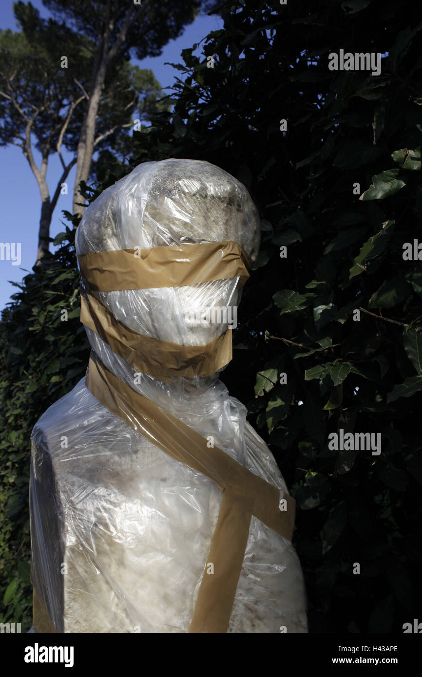 Statue, packed, plastic foil, adhesive tape, outside, Stock Photo