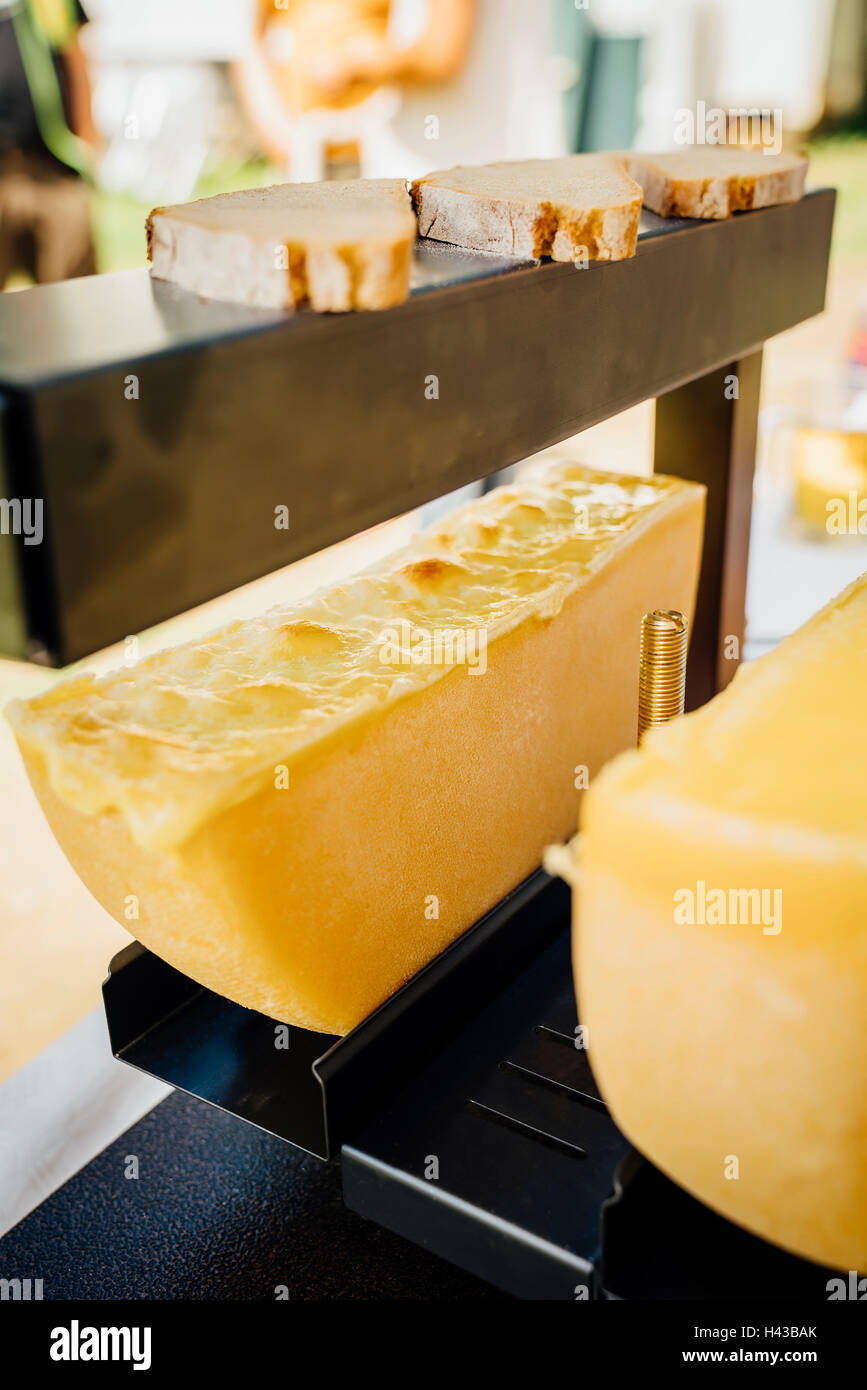 Wedges of cheese and sliced bread Stock Photo